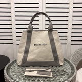 Side profile of premium everyday-luxe women's handbag – women's designer-style accessory