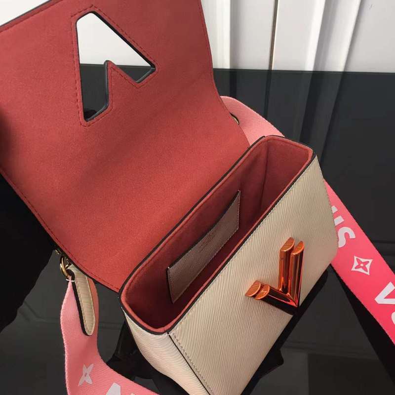 Handle and strap detail of polished statement women's handbag – women's premium purse