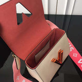 Handle and strap detail of polished statement women's handbag – women's premium purse