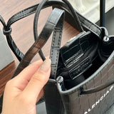 Ziva's Charm handbag – close-up view (one versatile size)
