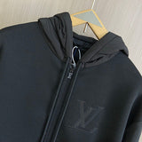 Close-up detail shot of Louis Vuitton luxury clothing with everyday silhouette