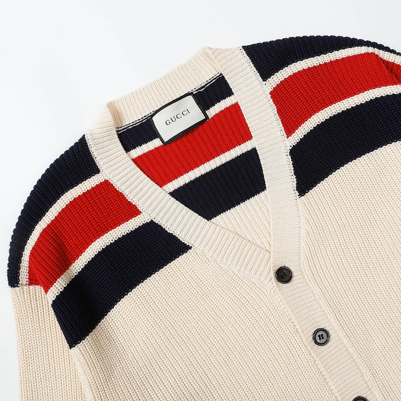 Close-up detail shot of Gucci luxury clothing with logo-detail design