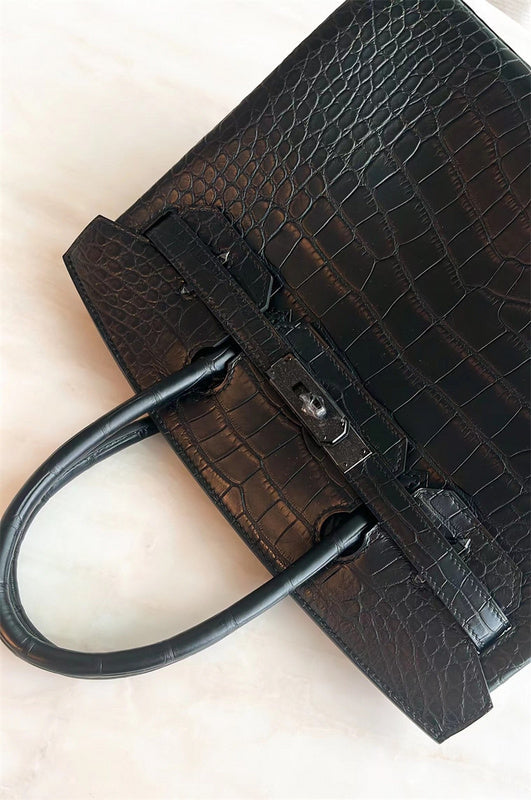  Graceful structured bag carried on shoulder