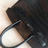  Graceful structured bag carried on shoulder