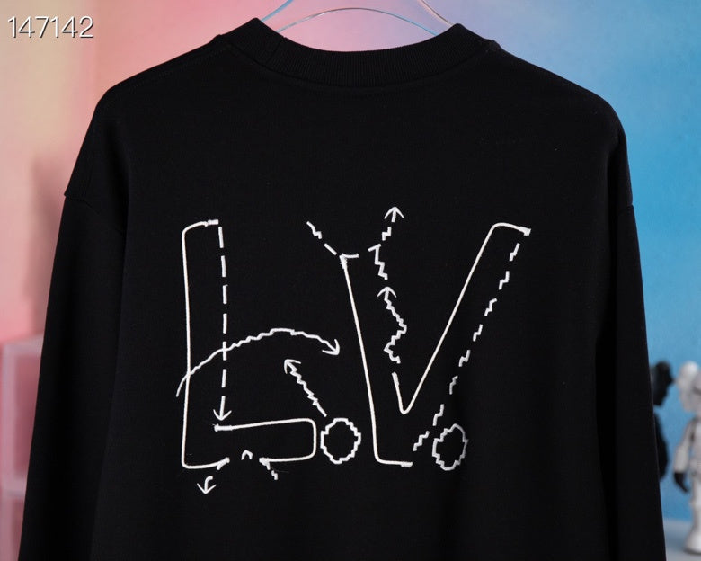 Full styled look of Louis Vuitton luxury clothing with tailored silhouette