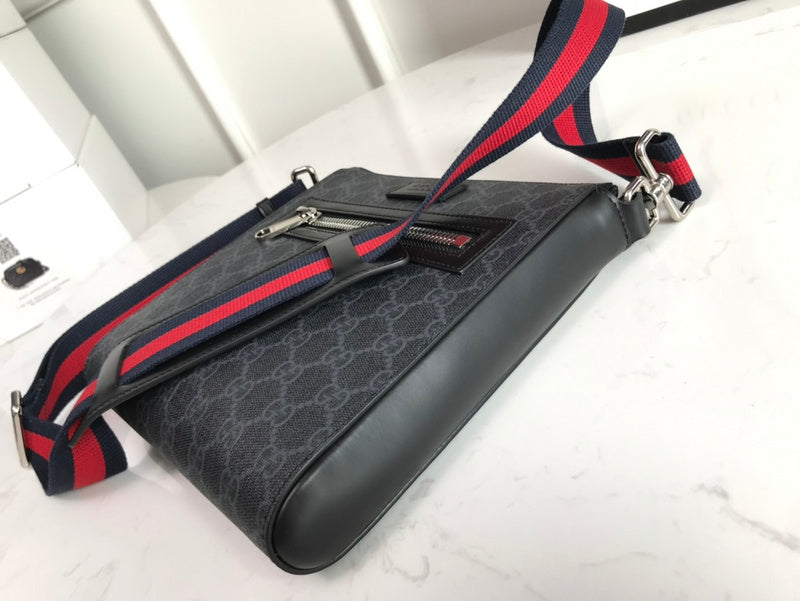 Handle and strap detail of modern signature women's handbag – women's statement bag