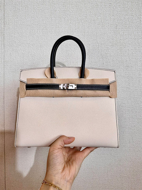 Side view of modern structured handbag