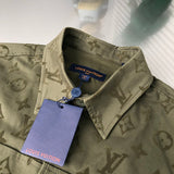 Close-up detail shot of Louis Vuitton luxury clothing with signature branding
