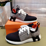 Hermès White High-Top Sneakers - Front View