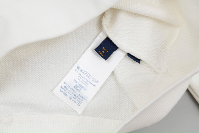 Front view of Louis Vuitton luxury clothing with signature branding