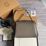 Front view of chic elevated women's handbag – women's statement bag