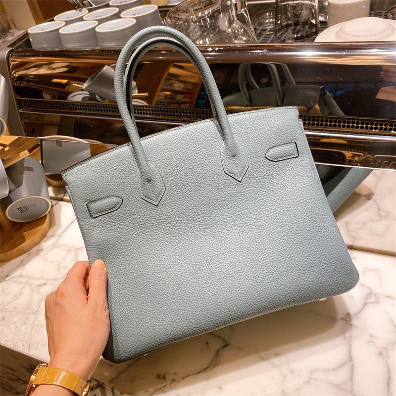  classic top-handle bag detail view showing craftsmanship 8