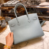  classic top-handle bag detail view showing craftsmanship 8