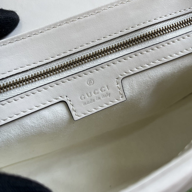Close-up detail of refined structured women's handbag – women's statement bag