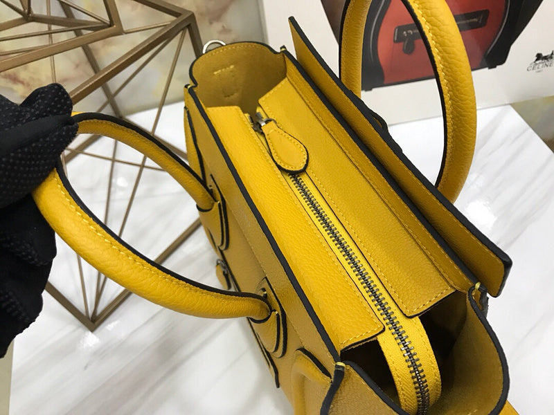 Handle and strap detail of classic structured women's handbag – women's everyday handbag
