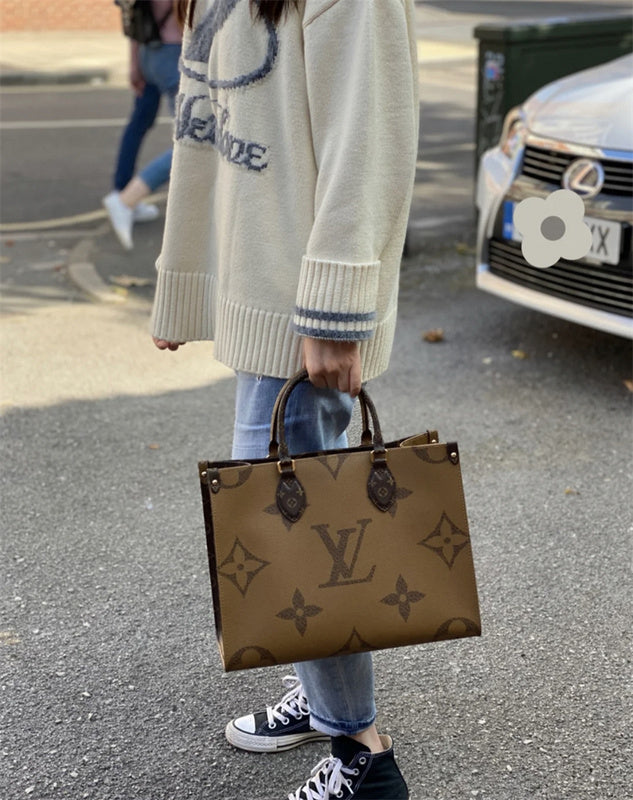  Tailored crossbody bag carried on shoulder 28