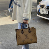  Tailored crossbody bag carried on shoulder 28