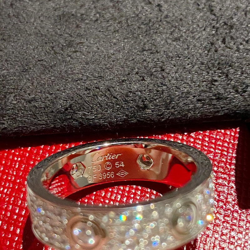 Side view of Cartier unisex jewelry piece