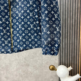 Back view of Louis Vuitton luxury clothing with label-forward styling