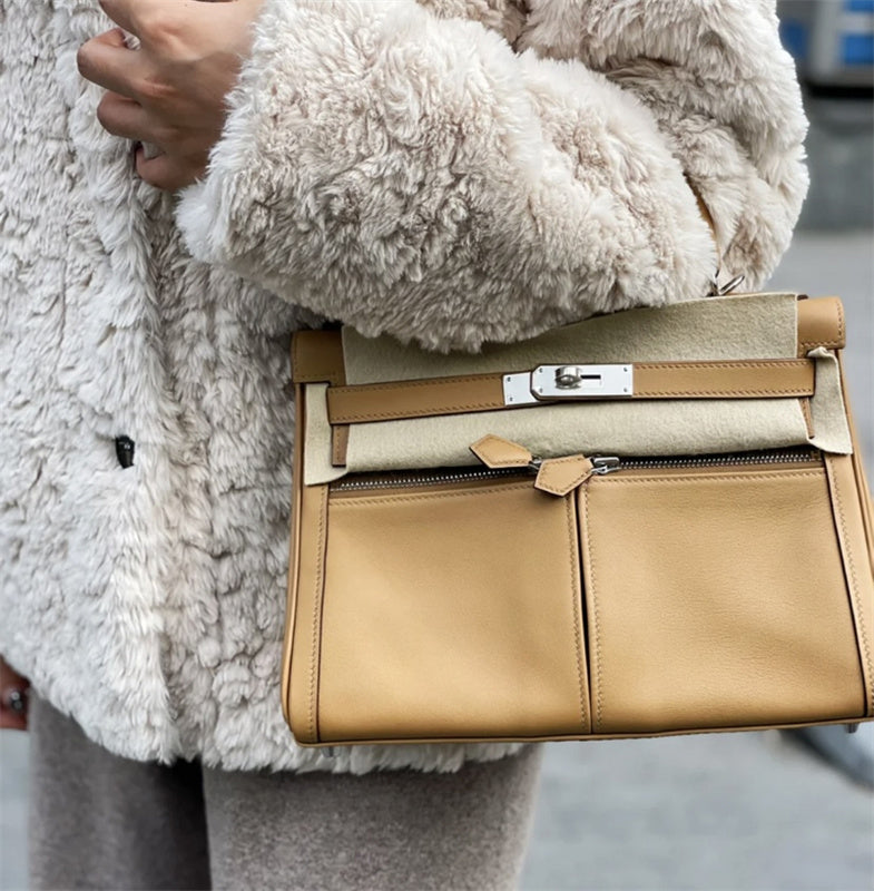 Side view of graceful structured handbag