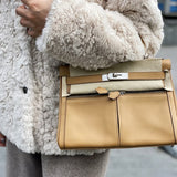 Side view of graceful structured handbag