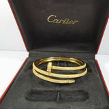 Close-up detail view of Cartier unisex jewelry piece
