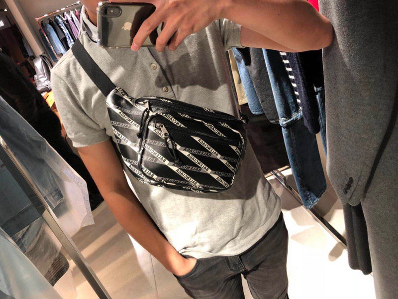 Back view of classic sleek women's handbag – women's luxury accessory