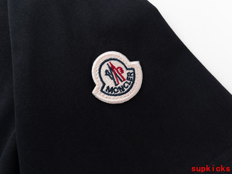 Front view of Moncler luxury clothing with logo-detail design
