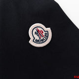 Front view of Moncler luxury clothing with logo-detail design