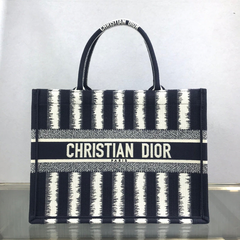Front view of modern statement women's handbag – women's luxury accessory