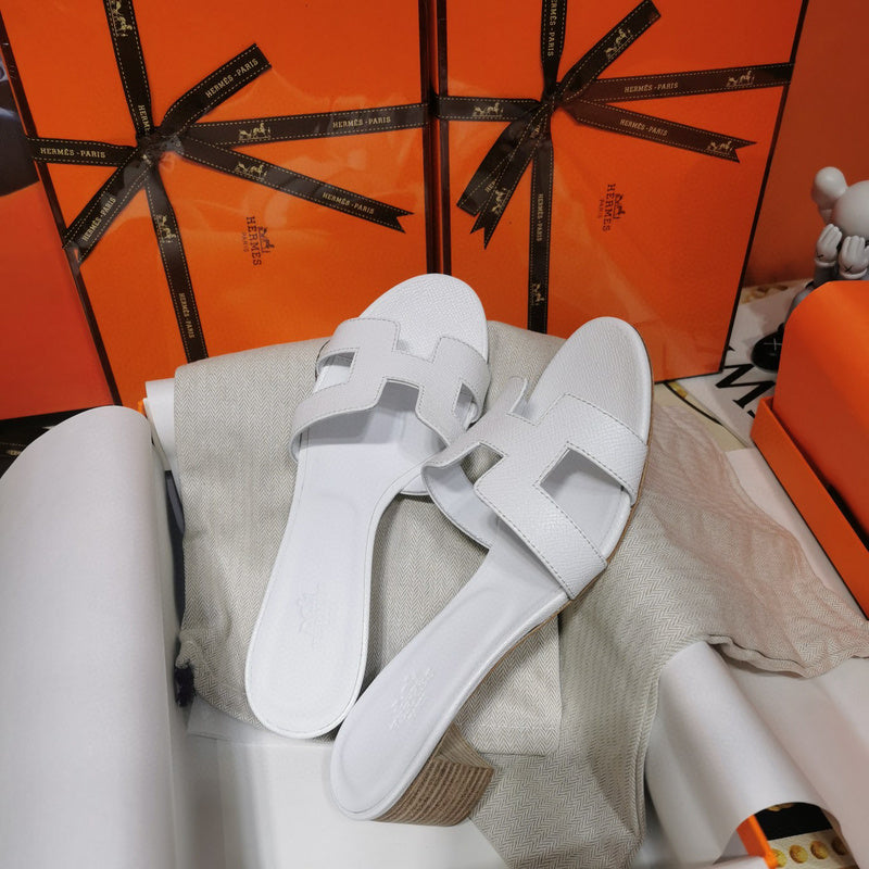 Hermès Red Crisscross Strap Sandals - Heel Detail View