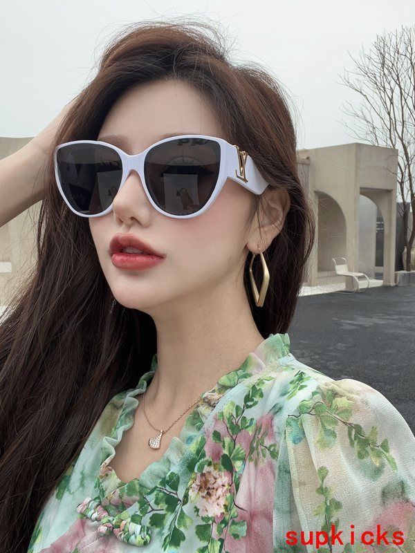 Close-up detail view of Louis Vuitton unisex sunglasses