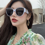 Close-up detail view of Louis Vuitton unisex sunglasses