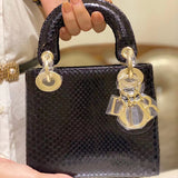 Front view of modern polished women's handbag – women's everyday handbag