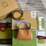 Front view of refined signature women's handbag – women's luxury accessory