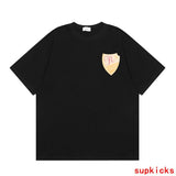 Front view of Rhude luxury clothing with monogram-inspired silhouette