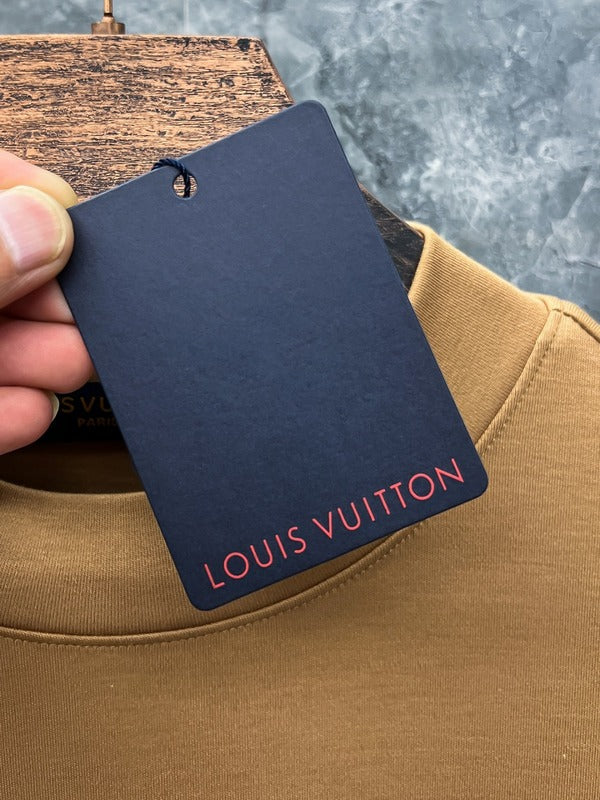 Close-up detail shot of Louis Vuitton luxury clothing with streetwear-inspired cut