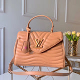 Side profile of refined signature women's handbag – women's statement bag