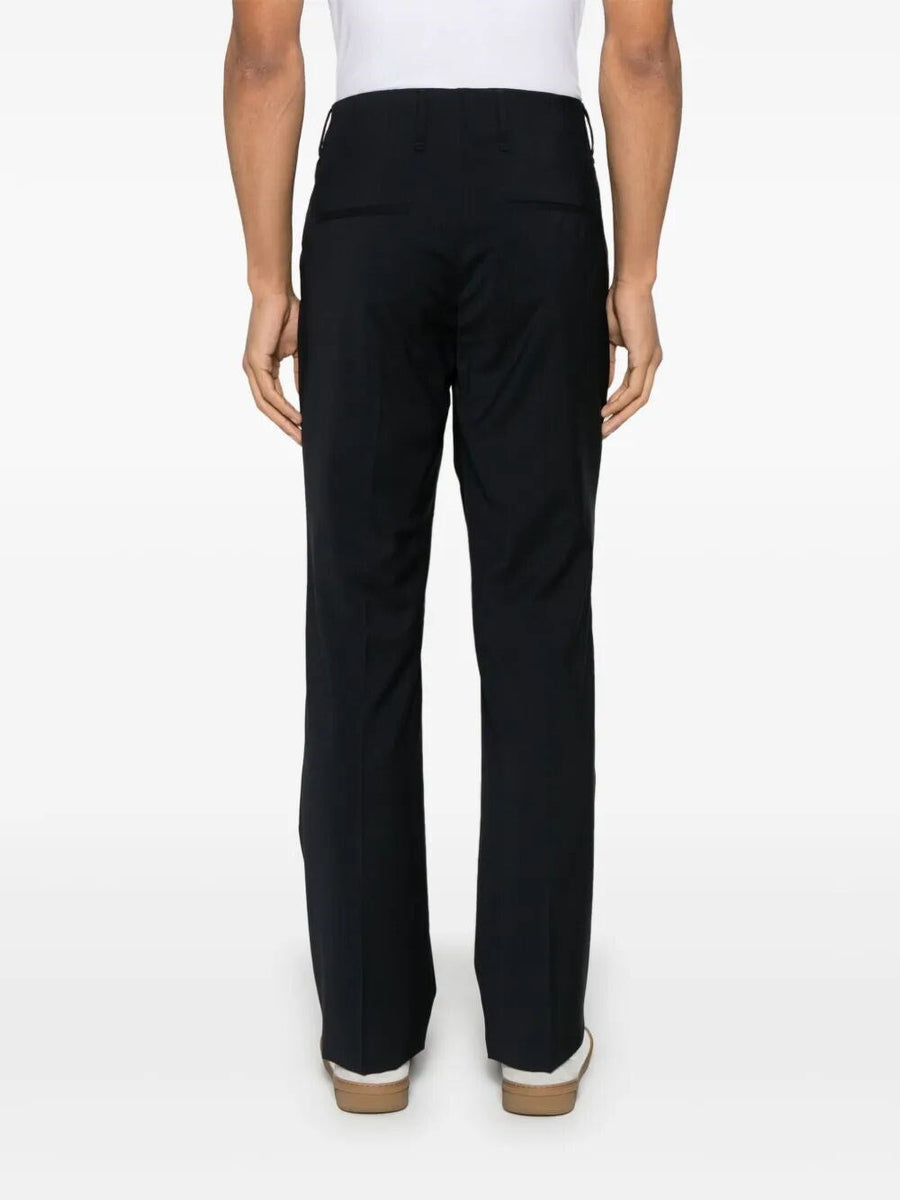 Close-up of Fendi pants hardware and fine stitching