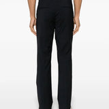 Close-up of Fendi pants hardware and fine stitching