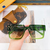 Side view of Louis Vuitton unisex sunglasses