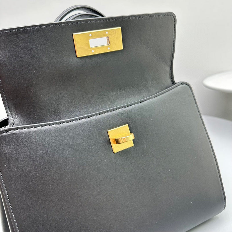 Zivas Charm Timeless Appeal Statement Handbag (Signature Shape & Finish) – Styled Look