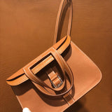 Close-up detail of sculpted bag design