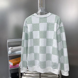Side profile of Louis Vuitton luxury clothing with label-forward styling