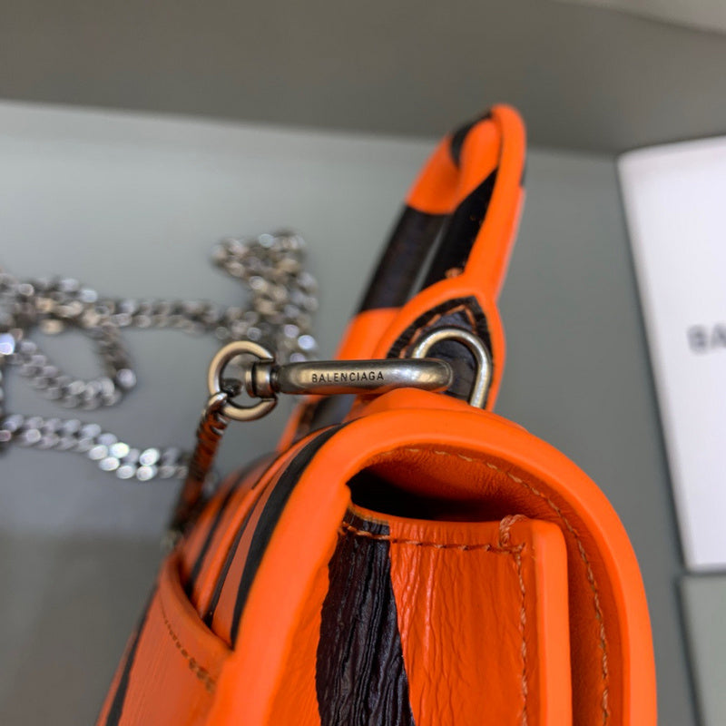 Understated Premium PU Leather Handbag - Statement Silhouette | Women's Premium Handbag #482 - styled full view (image 7) of designer-inspired handbag
