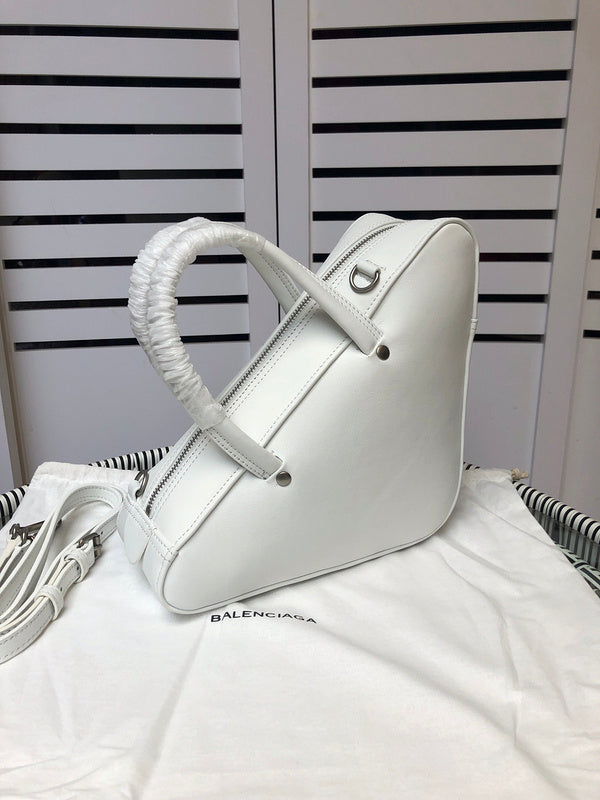 Front view of chic polished women's handbag – women's designer-style accessory