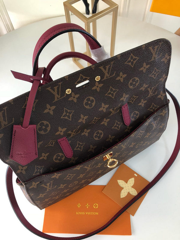 Handle and strap detail of chic elevated women's handbag – women's luxury accessory