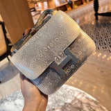 Understated shopper bag carried on shoulder