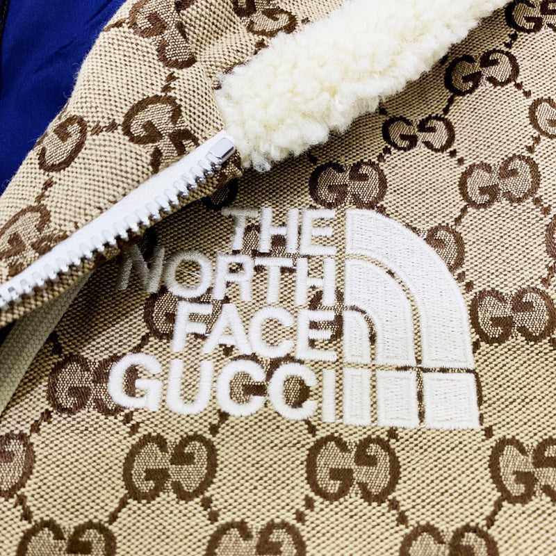 Front view of Gucci luxury clothing with label-forward styling