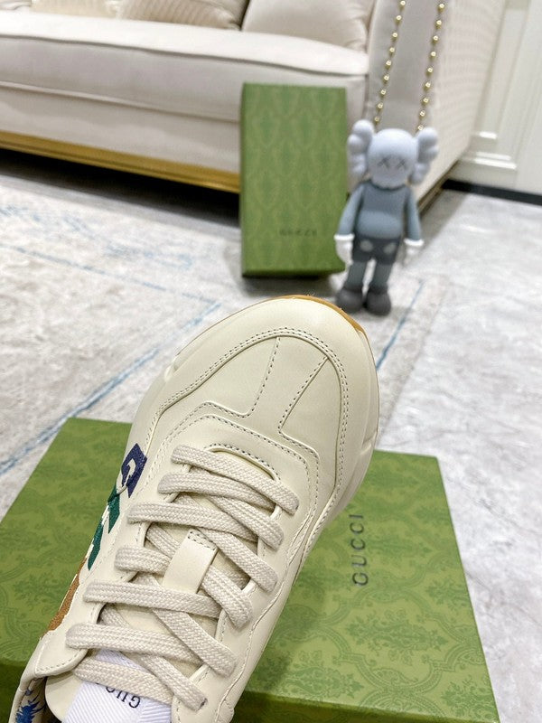 Side profile of Gucci clean off-white sneakers chunky sole construction